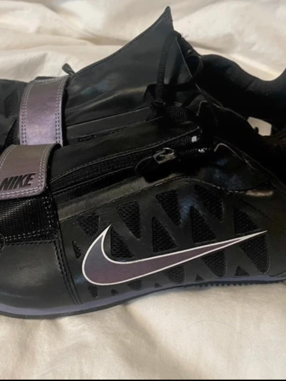 Nike Men’s Black Athletic Shoes with Purple Accents